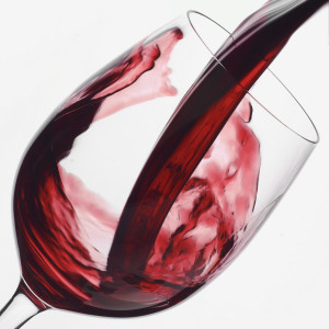 Red Wine Pouring Into Glass