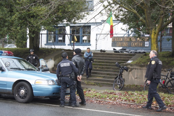 Police arrest a fourth man during Tuesday's raid